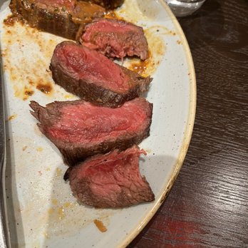 The Dotted Line - I asked for medium rare. This is rare and raw. The sauce was there as if to cover up a bad steak. - Breakfast & Brunch Near Me - Honolulu, Hawaii