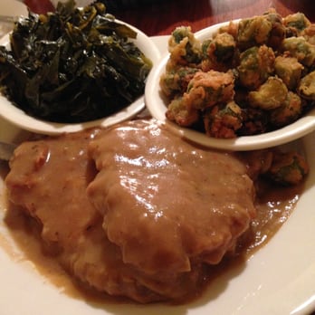 Amy Ruth's - Smothered Pork Chops with Collard Greens & Fried Okra - Southern Near Me - New York, New York Amy Ruth's - Smothered Pork Chops with Collard Greens & Fried Okra - Southern Near Me - New York, New York