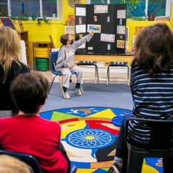 Oneness-Family Montessori School - 4th grader giving presentation during "Genius Hour."