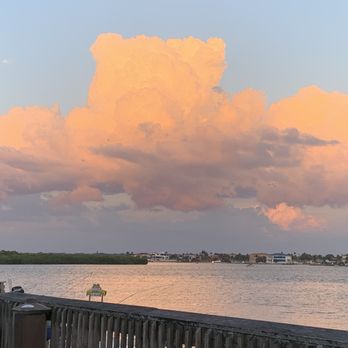 John's Pass - A beautiful sunset from the boardwalk (actually, from Pirates Pub & Grub), but facing east. - Shopping Centers Near Me - Madeira Beach, Florida
