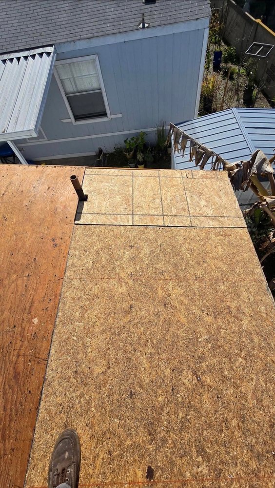 Slide of Vigil's Roofing