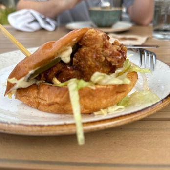 Sand Hill Kitchen - Amazing friend chicken sandwich. Already half eaten. Too good - New American Near Me - Menlo Park, California Sand Hill Kitchen - Amazing friend chicken sandwich. Already half eaten. Too good - New American Near Me - Menlo Park, California