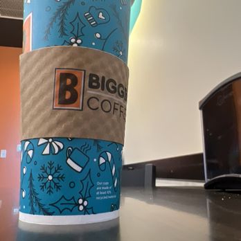 Biggby Coffee - a cup of coffee on a table - Coffee & Tea Near Me - Winston-Salem, North Carolina