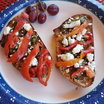Roots Farm Cafe - Toast with pesto, goat cheese, and red peppers - Coffee & Tea Near Me - Tijeras, New Mexico Roots Farm Cafe - Toast with pesto, goat cheese, and red peppers - Coffee & Tea Near Me - Tijeras, New Mexico