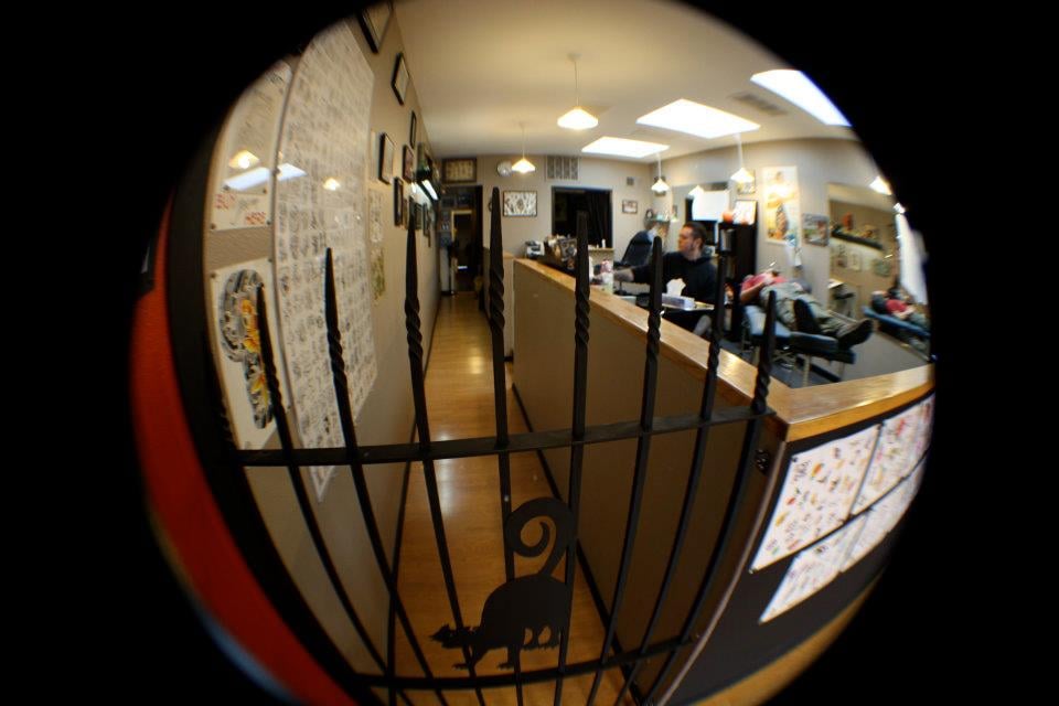 Nine Lives Tattoo Logo