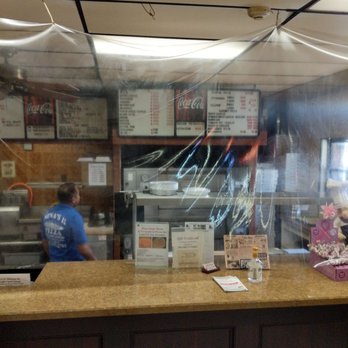 Nina's II Pizza - a man behind the counter - Pizza Near Me - Feasterville Trevose, Pennsylvania Nina's II Pizza - a man behind the counter - Pizza Near Me - Feasterville Trevose, Pennsylvania