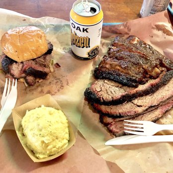 Franklin Barbecue - Brisket sandwich (it's a lot bigger than it looks in the pic), side of potato salad, 1lb brisket and 4 ribs. Easily serves 3-4 adults. - Barbeque Near Me - Austin, Texas