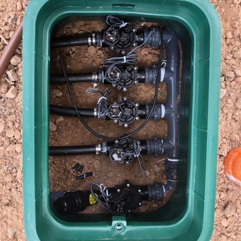FRA Landscape and Concrete - a green container filled with pipes - Masonry/Concrete Near Me FRA Landscape and Concrete - a green container filled with pipes - Masonry/Concrete Near Me