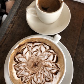 Briki Cafe - Mocha latte. Tastes good but was served cold. Judging the design, the barista might have a hangover. - Greek Near Me - Addison, Illinois