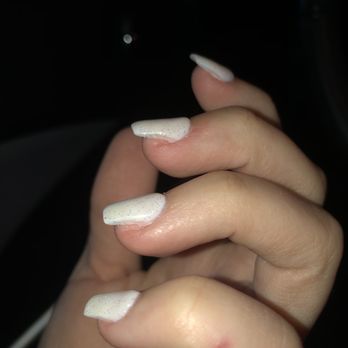 Bellagio Nails & Spa - Destroyed nails. Open flesh left from filing. You can see where my nail is still supposed to be covering the skin. - Nail Salons Near Me - Gainesville, Florida