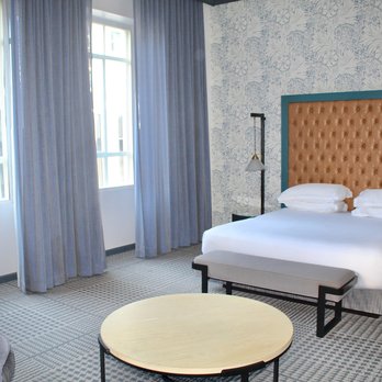 Kimpton Hotel Monaco Denver - The King Executive Suite featured a 1 King bedroom with a TV, a luxurious bathroom, a parlor with sleeper sofa, desk, and TV. - Hotels Near Me - Denver, Colorado