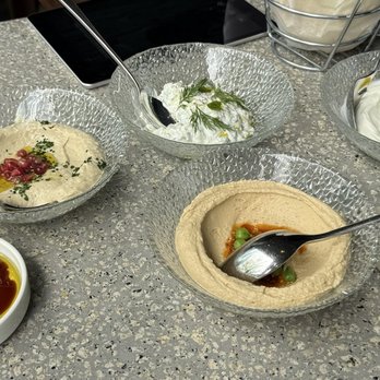 Zaytinya - Mezze Lunch - Spreads options (L-R): HOMMUS, TZATZIKI, LABNEH - Lebanese Near Me - Nashville, Tennessee Zaytinya - Mezze Lunch - Spreads options (L-R): HOMMUS, TZATZIKI, LABNEH - Lebanese Near Me - Nashville, Tennessee