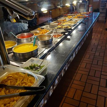 New China Buffet - Clean floors, Counters and employees are standing by watching to reload hot trays of food at Buffet $14.99.  3/10/2024 - Chinese Near Me - Imlay City, Michigan