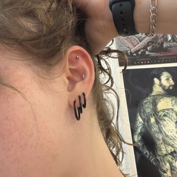 Wild Bill's Tattoo - My ear - Tattoo Near Me - Roseville, California Wild Bill's Tattoo - My ear - Tattoo Near Me - Roseville, California