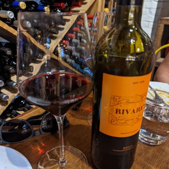 Toro Kitchen + Bar - Drinking wine on the wine room - Tapas Bars Near Me - San Antonio, Texas Toro Kitchen + Bar - Drinking wine on the wine room - Tapas Bars Near Me - San Antonio, Texas