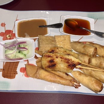Thai Garden - Thai sampler with springs roll , spring shrimp  roll  , fried tofu , grill chicken , and a side of peanut sauce to dip and sweet sauce . - Thai Near Me - Duncan, South Carolina