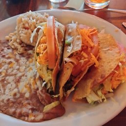 Three taco plate from regular menu with rice& beans.