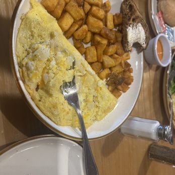 The Red Rooster Labelle - Cheese omelette Nicely cooked and tasty - Wraps Near Me - LaBelle, Florida The Red Rooster Labelle - Cheese omelette Nicely cooked and tasty - Wraps Near Me - LaBelle, Florida