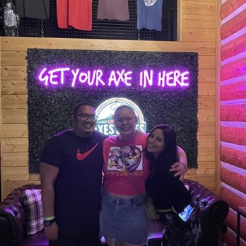 Limitless Axes & Ales - Nice backdrop to take pictures! T-shirts above are for sale. - Bars Near Me - Pleasanton, California