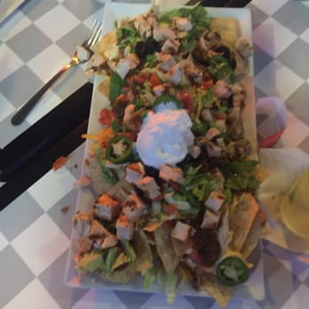 Johnny Huston's - Quite the pile of Nachos - Seafood Near Me - Navarre, Florida Johnny Huston's - Quite the pile of Nachos - Seafood Near Me - Navarre, Florida