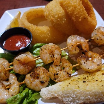 Stewarts Bar & Grill - Grilled Shrimp and onion rings - American Near Me - Caldwell, Idaho Stewarts Bar & Grill - Grilled Shrimp and onion rings - American Near Me - Caldwell, Idaho