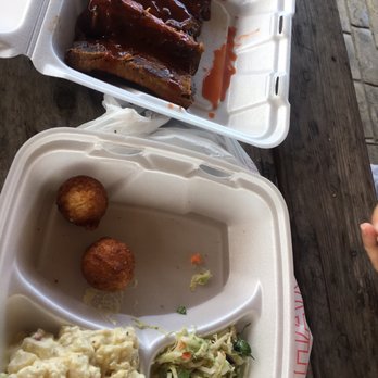 Currituck BBQ - 1/2 slab of ribs with homemade coleslaw, potato salad, and hush puppies. - Barbeque Near Me - Barco, North Carolina Currituck BBQ - 1/2 slab of ribs with homemade coleslaw, potato salad, and hush puppies. - Barbeque Near Me - Barco, North Carolina