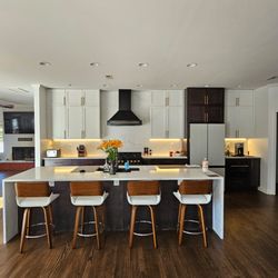 Marble Unlimited - Kitchen remodel with Quartz full splash waterfall end panels