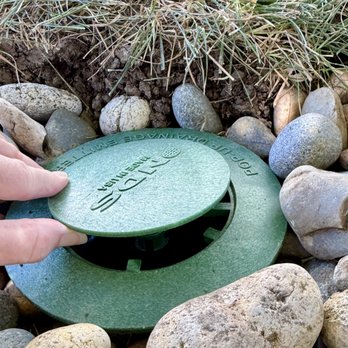 A3 in 1 Irrigation Specialist - Top lifts up when water comes out. The rocks are to prevent the soil from washing away around the collar until the new grass grows strong. - Irrigation Near Me - Denver, Colorado