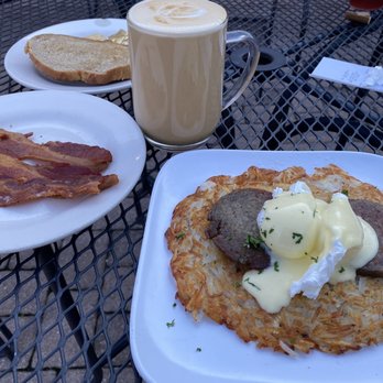 Our Daily Bread Bakery & Bistro - Outside patio. Eggs Benedict over hash browns with sausage patties. Large caramel Latte - Bakeries Near Me - Roanoke, Virginia Our Daily Bread Bakery & Bistro - Outside patio. Eggs Benedict over hash browns with sausage patties. Large caramel Latte - Bakeries Near Me - Roanoke, Virginia