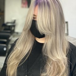 A bold shadow root and all over blonde