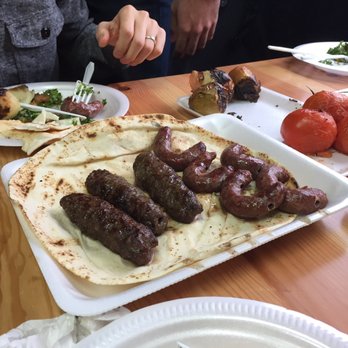 Dearborn Meat Market - Sausage and kefta with grilled tomatoes and onions. - Meat Shops Near Me - Dearborn, Michigan Dearborn Meat Market - Sausage and kefta with grilled tomatoes and onions. - Meat Shops Near Me - Dearborn, Michigan
