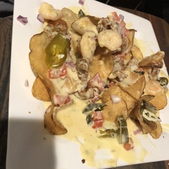 Trapps - Seafood Nachos after we had eaten about a 1/3 of the plate! - Cajun/Creole Near Me - West Monroe, Louisiana Trapps - Seafood Nachos after we had eaten about a 1/3 of the plate! - Cajun/Creole Near Me - West Monroe, Louisiana