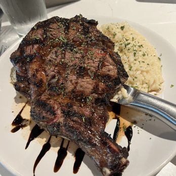 Fifth Avenue Syndicate - 20oz Ribeye, risotto to substitute side vegetable - Cocktail Bars Near Me - Moline, Illinois