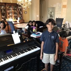 More happy students at the Cupcakes and Clavinova Class