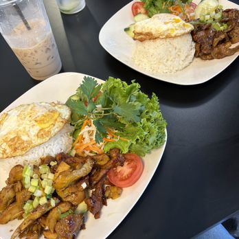 Tastea Vietnamese Grill - Grilled Chicken Rice Plate (left) and Grilled Pork Rice Plate (right) - Vietnamese Near Me - Rosenberg, Texas Tastea Vietnamese Grill - Grilled Chicken Rice Plate (left) and Grilled Pork Rice Plate (right) - Vietnamese Near Me - Rosenberg, Texas