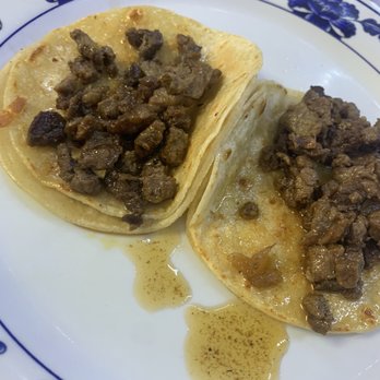 Taqueria El Sabor - two tacos on a plate - Mexican Near Me - Kent, Washington Taqueria El Sabor - two tacos on a plate - Mexican Near Me - Kent, Washington
