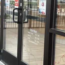 Hours posted on front door