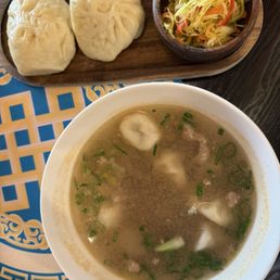 Dumpling Soup combo/special with two steamed buns and pickled slaw Dumpling Soup combo/special with two steamed buns and pickled slaw