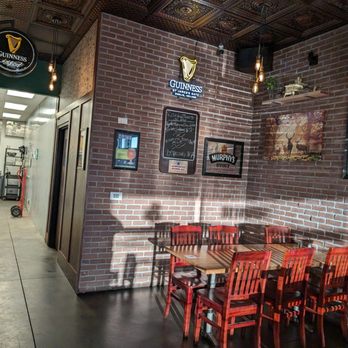 Abby's Irish Pub - a brick wall and tables - Irish Pub Near Me - Colorado Springs, Colorado Abby's Irish Pub - a brick wall and tables - Irish Pub Near Me - Colorado Springs, Colorado