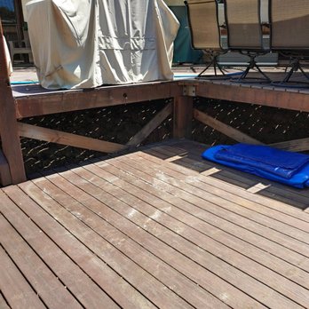 Blue Coast Deck & Patio - The lower deck level after the hot tub was removed before Blue Coast's work. It looks 100% better now!! - Decks & Railing Near Me Blue Coast Deck & Patio - The lower deck level after the hot tub was removed before Blue Coast's work. It looks 100% better now!! - Decks & Railing Near Me