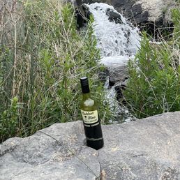 On a hiking trip at Ancient Lakes WA. Took our vino wine and vino tins. Nice treat at the halfway point.
