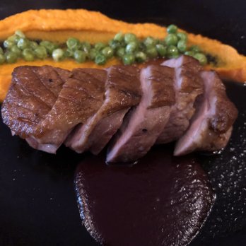 Bistro Cacao - Duck with chewy sauce, carrot purée and peas - French Near Me - Washington, DC, District of Columbia