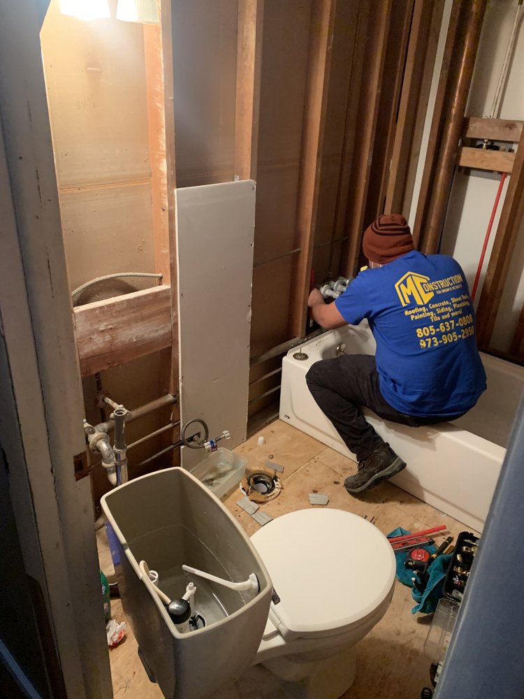 Slide of MC Construction & Remodeling