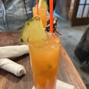 MangoSeed Restaurant - Passion fruit rum punch. - Caribbean Near Me - Brooklyn, New York