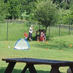 Joyous Montessori Keller - Sports activity in our playground