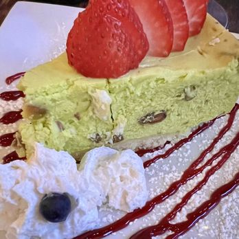 Dockside Market & Grill - Pistachio Cheesecake with Raspberry Sauce, Strawberries and Whipped Cream - Seafood Near Me - Flemington, New Jersey Dockside Market & Grill - Pistachio Cheesecake with Raspberry Sauce, Strawberries and Whipped Cream - Seafood Near Me - Flemington, New Jersey