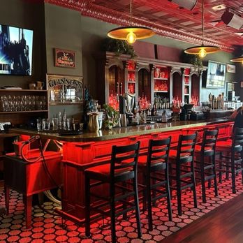 Red Leprechaun - The hand carved bar that was shipped over from Ireland. - Irish Pub Near Me - Cincinnati, Ohio