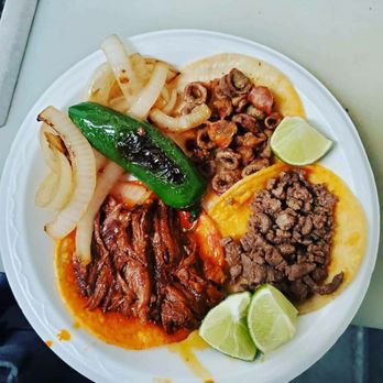 Tacos Nevarez - a plate of mexican food - Food Trucks Near Me - Fresno, California Tacos Nevarez - a plate of mexican food - Food Trucks Near Me - Fresno, California