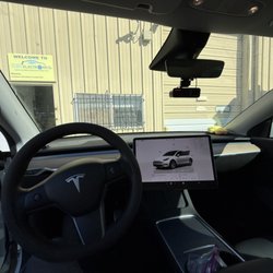 Guru Electronics Car Audio - Radar detector hardwired in a Tesla Model Y. Mounted using vehicle specific mirror mount by blendmount. Super clean!