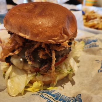 Islands Restaurant - Don't remember the name, but it was the spicy burger (jalapeño, fried onions strings,  chipolte aioli) - American Near Me - Phoenix, Arizona